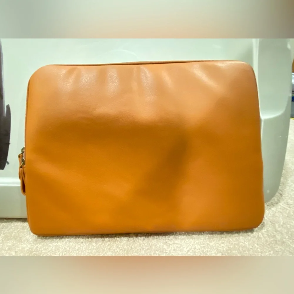 Sleek Tan Laptop Sleeve. NEW. Interior is super soft gray material.